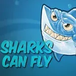 Hình ảnh một con cá mập hoạt hình màu xanh đang cười giơ hàm răng cùng dòng chữ Sharks Can Fly