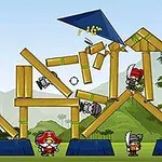Cấu trúc hình ngôi nhà bằng gỗ bị sụp đổ do một quả đạn bắn vào, với các nhân vật đội nón đỏ đứng bên cạnh