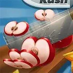 Một con dao đang cắt lát táo và các loại trái cây khác như khế trên nền xanh