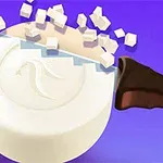 Một con dao đang cắt một bánh xà phòng màu trắng thành các khối nhỏ trên nền xanh