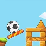 Quả bóng đá lơ lửng giữa khung thành nhỏ và công trình bằng gỗ với bầu trời xanh phía sau
