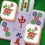 Các quân cờ màu sáng với hoa văn hoa hồng và ký tự Trung Quốc trên nền xanh lục, được trang trí bằng cánh hoa màu hồng