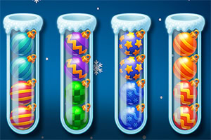 Các ống nghiệm chứa các quả bóng nhiều màu sắc và họa tiết khác nhau trên nền xanh với tuyết rơi