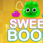 Ba nhân vật gelatin màu xanh lá, hồng và xanh da trời với khuôn mặt dễ thương phía trên dòng chữ SWEET BOOM trên nền vàng