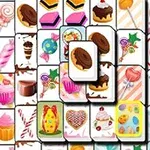 Các viên gạch trắng với hình vẽ bánh ngọt và kẹo đầy màu sắc