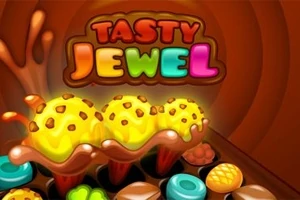 Ba ly kem màu vàng rưới sô-cô-la với hạt trang trí và dòng chữ Tasty Jewel đầy màu sắc phía trên