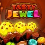 Ba ly kem màu vàng rưới sô-cô-la với hạt trang trí và dòng chữ Tasty Jewel đầy màu sắc phía trên