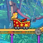Chiếc xe trượt màu đỏ với hình ngôi sao đang đi trên đường ray trong khu rừng hoạt hình đầy màu sắc
