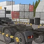 Xe tải đầu kéo màu trắng đang đỗ trong bãi chứa hàng với các container và rào chắn xung quanh