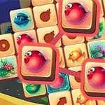 Các ô vuông với hình ảnh cá và san hô đầy màu sắc, nổi bật là ba ô với hình cá màu đỏ được kết nối với nhau