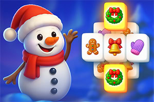 Người tuyết đội mũ đỏ bên cạnh các khối vuông có biểu tượng Giáng sinh như người bánh gừng, chuông và vòng hoa