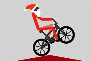 Người mặc đồ ông già Noel đang lái xe đạp trên mặt đất màu đỏ