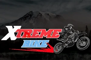 Hình ảnh mô tả một người lái xe moto địa hình với dòng chữ Xtreme Bike trên nền núi