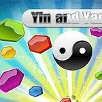 Biểu tượng âm dương ở trung tâm với nền là các viên đá màu sắc rực rỡ