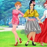 Ba nhân vật nữ ăn mặc thời trang đứng tạo dáng trong công viên xanh tươi